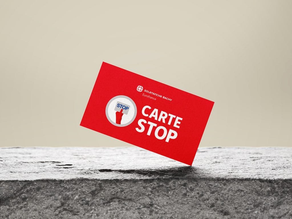 Worker with a card in hand