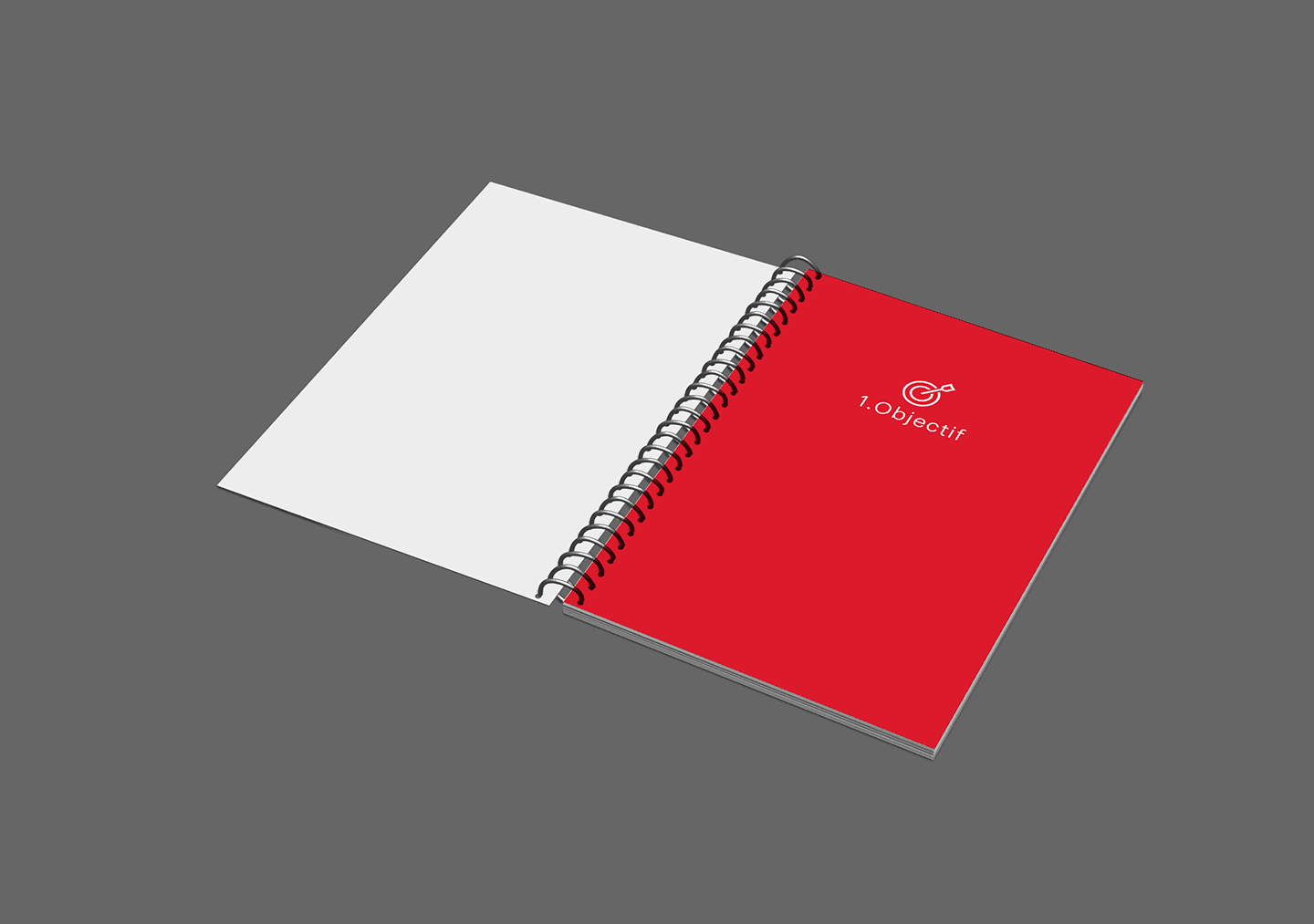Carnet de notes ouvert avec design moderne, page rouge Objectif, projet de Comhit, agence de branding à Paris.