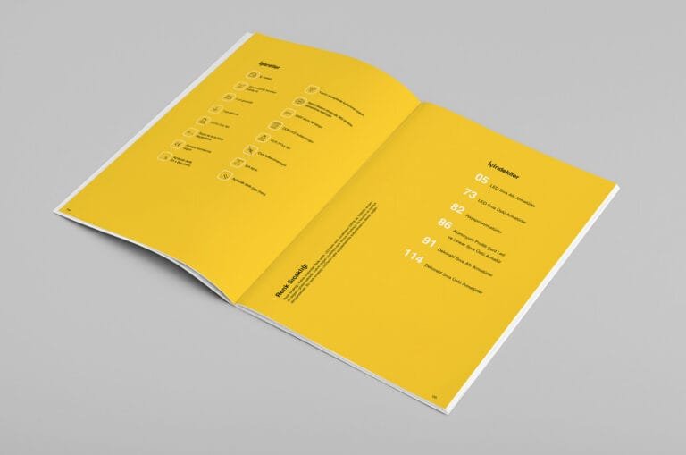 Design moderne de brochure jaune avec icônes minimalistes et typographie élégante, créé par Comhit, agence de branding à Paris.