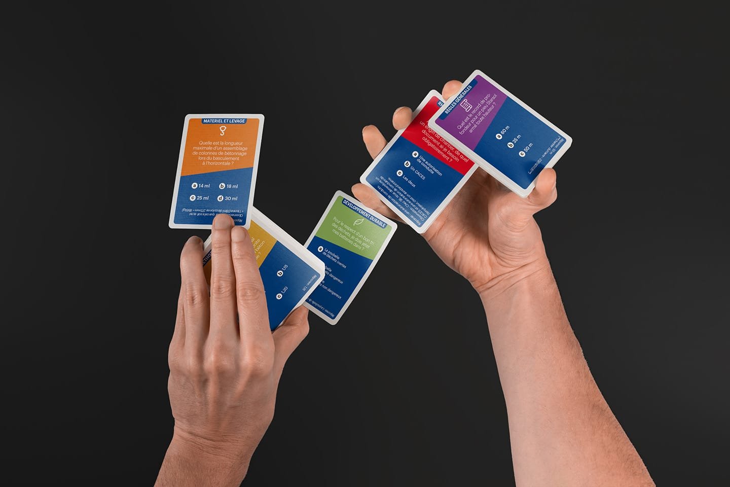 Colourful game cards for an interactive experience, designed by the branding agency Comhit, Paris.